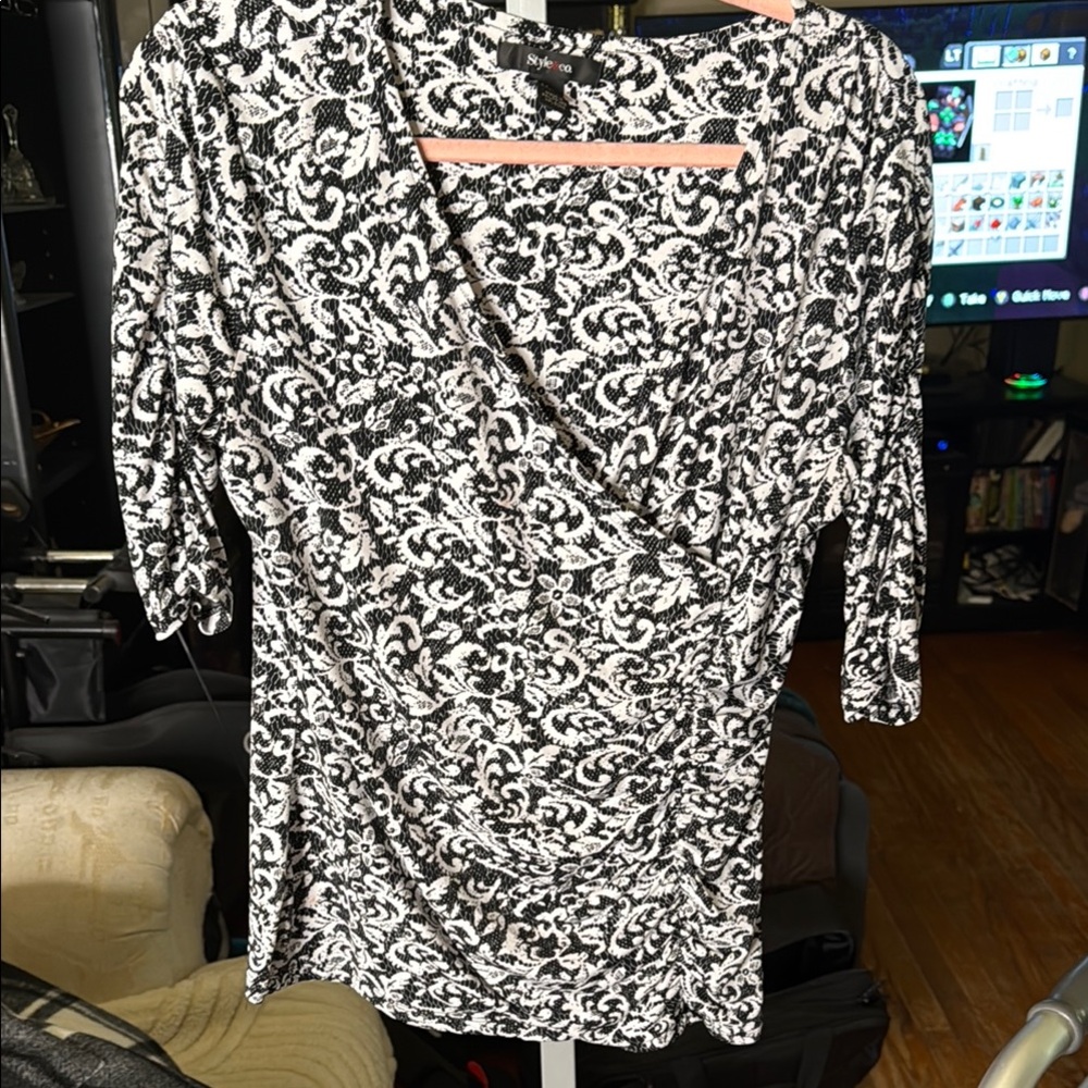 Elegant Black and White Patterned Wrap Top
